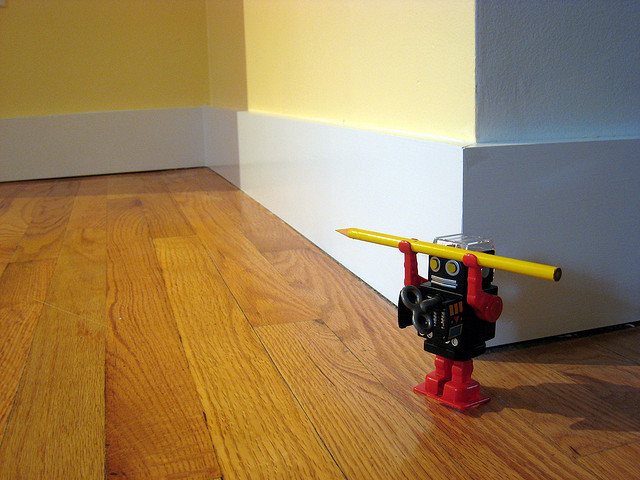 Dust Baseboards with Dryer Sheets to Keep them Cleaner Longer