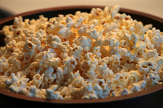 Pop Salty Popcorn in a Stainless Steel Bowl