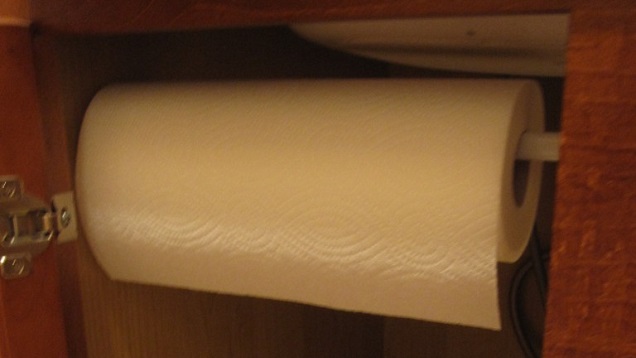 Aha! Hack: Tension Rod as Paper Towel Holder - The Organized Home